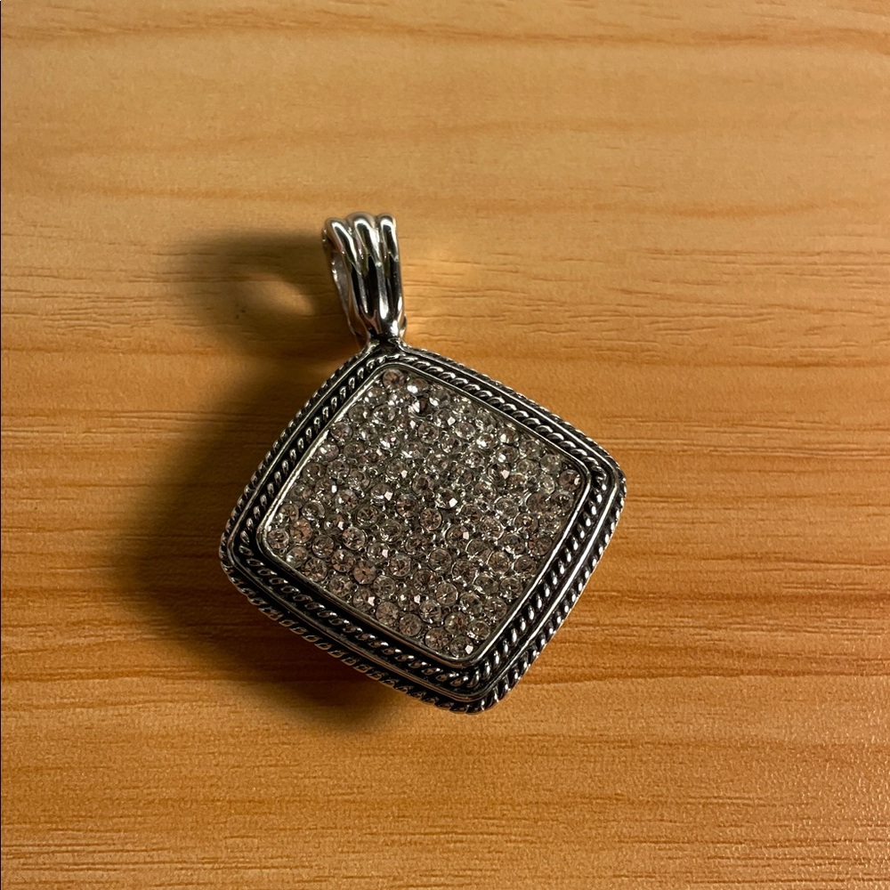 Elegant Silver Pendant with Crystal Accents